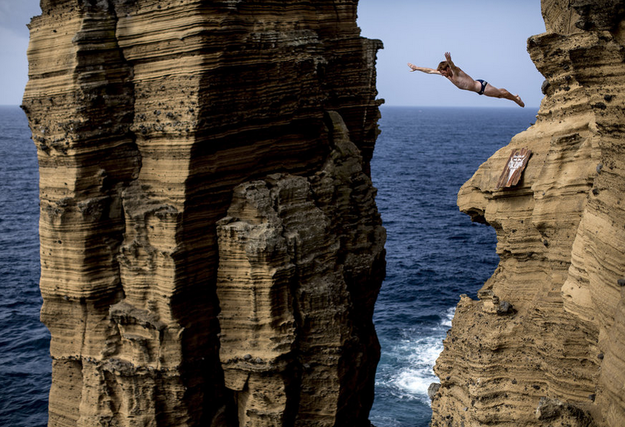 In professional cliff diving competition, the platform is 65 feet high for women and 90 feet high for men.