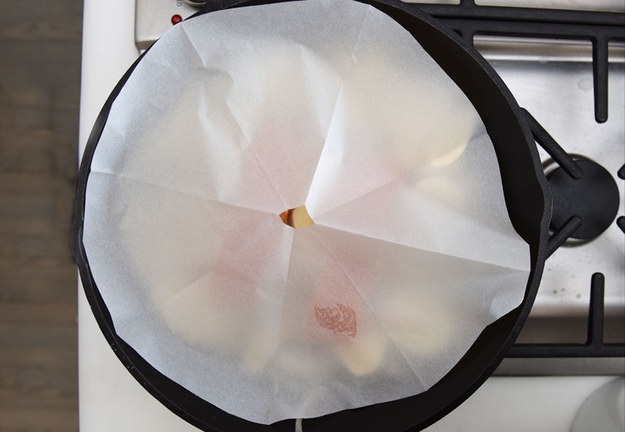 Cover it with the parchment lid to cook it, like this: