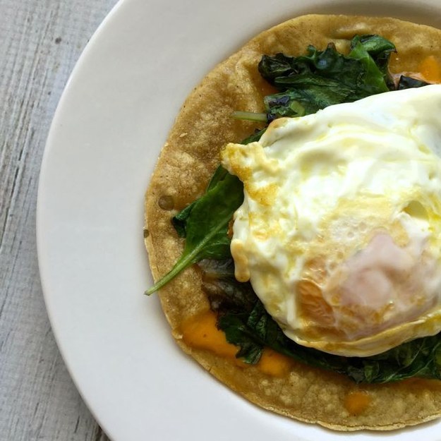 Corn Tortilla with Melted Cheese, Sautéed Baby Greens, Salsa, &amp; Fried Egg