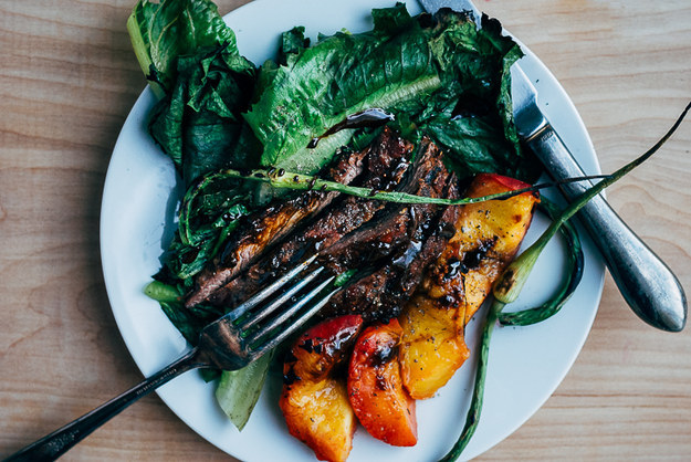 Grilled Steak Salad with Garlic Scapes and Peaches