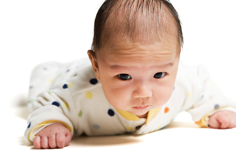 Image: Some babies don’t like tummy time but it’s important to strengthen their neck.